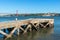 Fisher on a pier at Tagus river, Lisbon (Portugal)