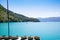 Fisher in a rowing boat on a blue lake