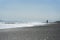 Fisher standing in the beach ,Bali