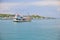 Fisheries boat and village scene along the coastal area