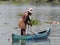 Fisherman in alleppey backwaters of Kerala