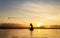 Fisherman of Bangpra Lake in action when fishing