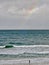 A fisherman on the beach by Rainbow Beach town - Queensland, Australia