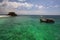 Fisherman boat on Andaman turquoise at Ko Lipe island