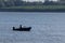 Fisherman in the boat on Danube river