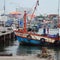 Fisherman boat docking at port, Thailand