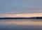 Fisherman in a boat early morning on the lake