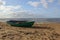 Fisherman boat that lay at the beach front. Baltic beach and its landscape.