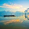 Fisherman boat parking with full reflection during sunrise