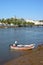 Fisherman in boat on the river Gilao, Tavira.