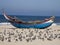 Fisherman boat on the sand