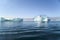 Fisherman boats between Icebergs, Greenland