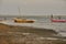 Fisherman with boats at shore