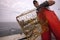 Fisherman bringing in the crab baskets