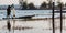 Fisherman on canoe in tropical Bungva lake