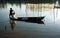 Fisherman cast a net on river