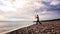 Fisherman casts his fishing rod at Qixingtan Beach in Hualien, Taiwan