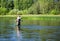 Fisherman catches of chub fly fishing in the Chusovaya river