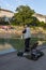 A fisherman catches fish on the Danube Canal embankment in Vienna