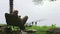 A fisherman catches fish on the river on a warm spring day 