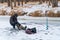 Fisherman catches a fish on winter fishing