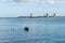 Fisherman checking his traps and catching octopus near Setubal on the Sado River Estuary