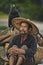 Fisherman with cormorants on the river Lijiang