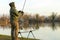 Fisherman doing carp fishing