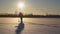 Fisherman drills a hole ice fishing