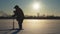 Fisherman drills a hole ice fishing