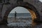 Fisherman on duty, in a coastal town in Grece