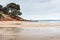 Fisherman at the end of the rocks at Erehwon Point Beach, Cowes, Phillip Island, Victoria, Australia