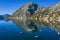 A fisherman fishing in Boka bay, Montenegro.