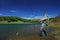 A fisherman fishing on a Mavrovo lake