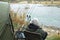 Fisherman with fishing rods by the lake in a picturesque place