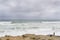 Fisherman fishing in rough see at Cape of Good Hope