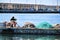 Fisherman fixing the nets in the dock of Santa Pola