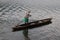 Fisherman. freshwater lake, small wooden boats.