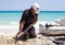 A fisherman guts a freshly caught fish on a Cuban beach 04 28 2022