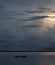 Fisherman on His Boat at Sunset. Fishermen Boat at Sunset