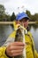 Fisherman Holding Northern Pike