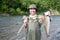 Fisherman holds caught pink salmon.