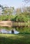 Fisherman at pond in Bialowieza National Park