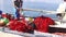 Fisherman prepares his fishing nets on his boat