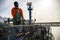 Fisherman puts crab inside octopus traps at the local harbor in Alvor, Portugal