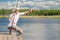 A fisherman in rural clothes on a fishing trip