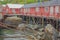 Fisherman`s houses along the walkway in the harbor of Nusfjord