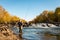 Fisherman shows excitement after catching a fish in the Boise River.