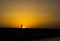 Fisherman at sunset in Alimos marina in Athens, Greece