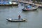 Fisherman and traditional fishing boats anchor in ca ty river